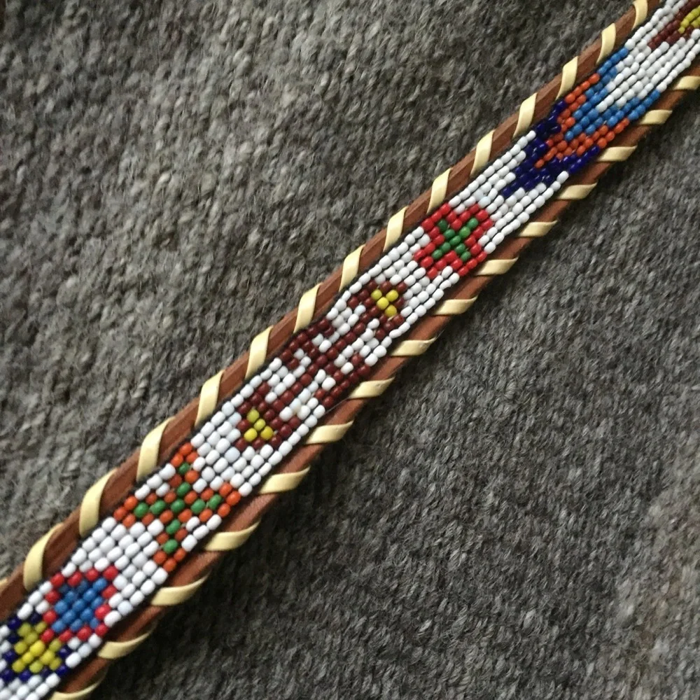 Vintage beaded belt size 26. Firebird design.